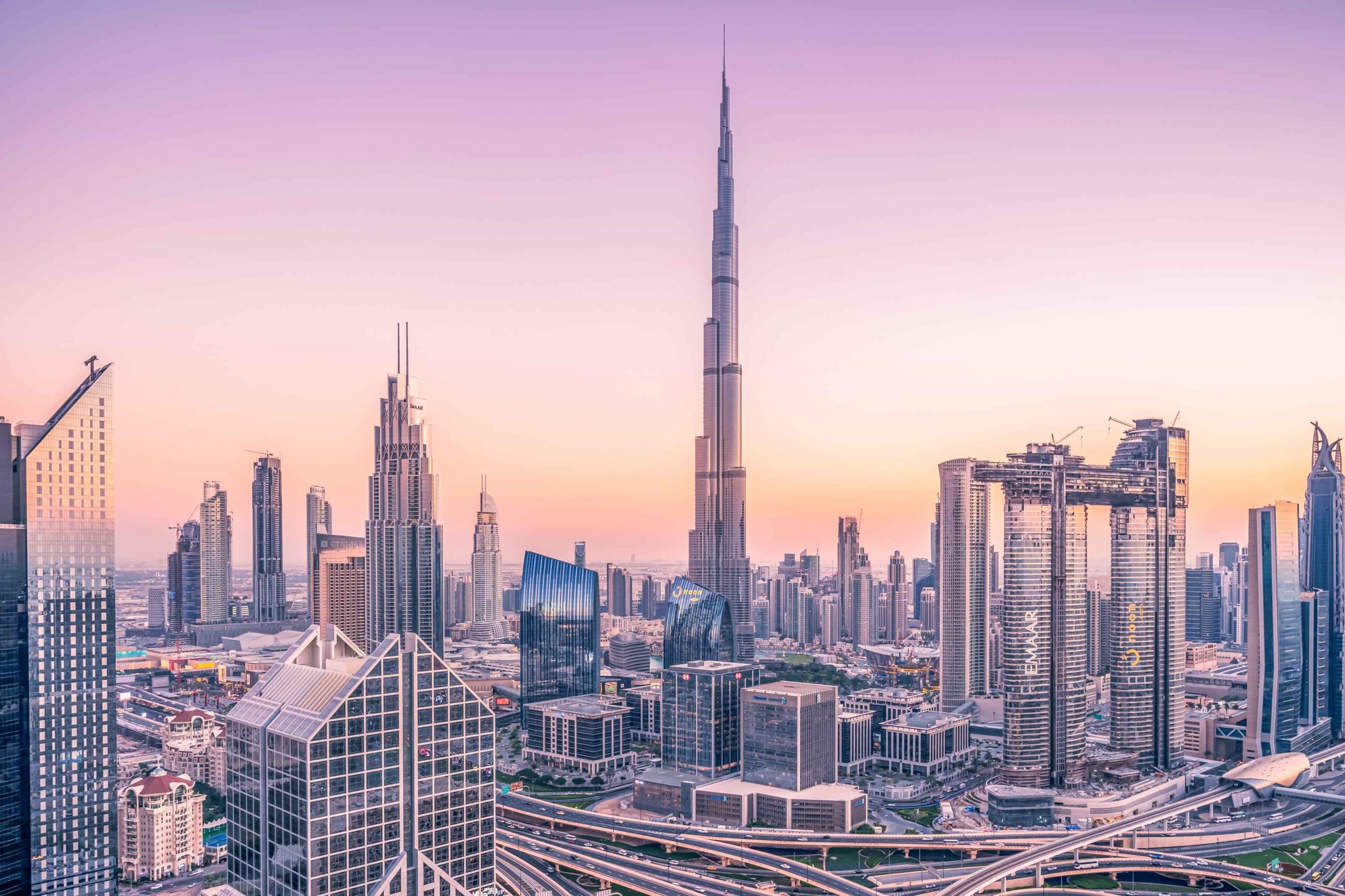 a city skyline with tall buildings