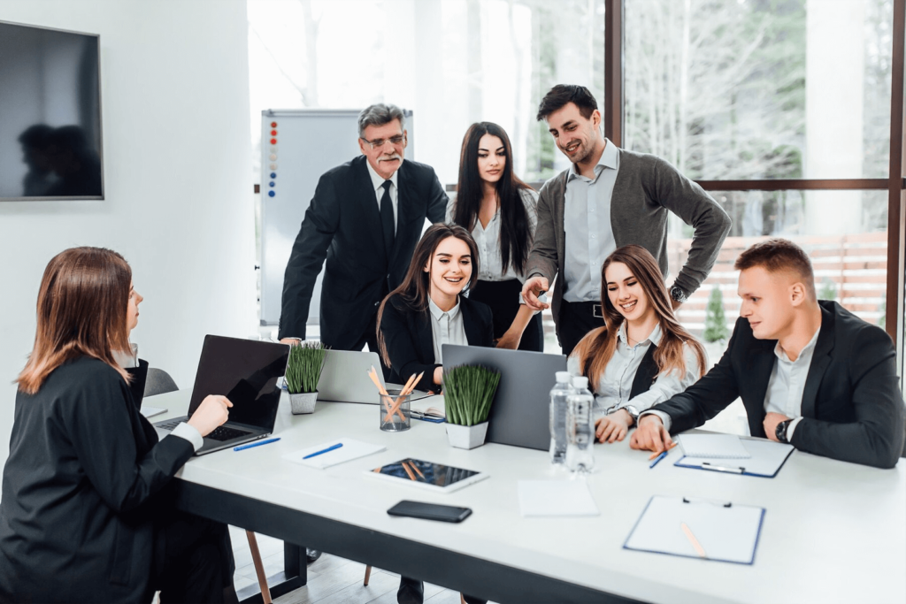 a group of people around a table